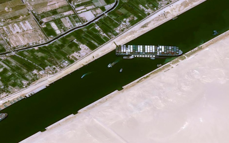 It Needs at Least a Week to Dislodge Giant Container Ship Stuck at Suez Canal