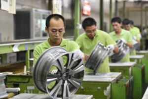 China’s Manufacturing Narrowly Misses Contraction but Services PMI Slips to 47.5