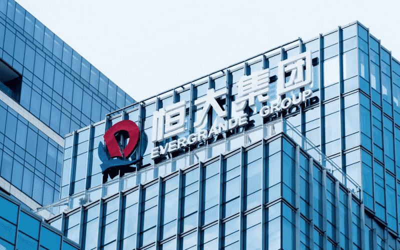 Evergrande Lifts Chinese Property Stocks After Settling a Last-Minute Bond