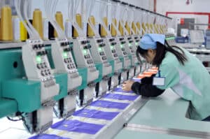 China’s Factory Activity Crawls Back to Expansion in Nov. on Easing of Bottlenecks