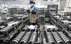 China’s Factory Output Beats Estimates in Nov., but Headwinds Dampen Retail Growth